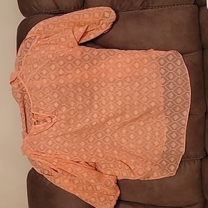 Woman's peach shirt by Maurice